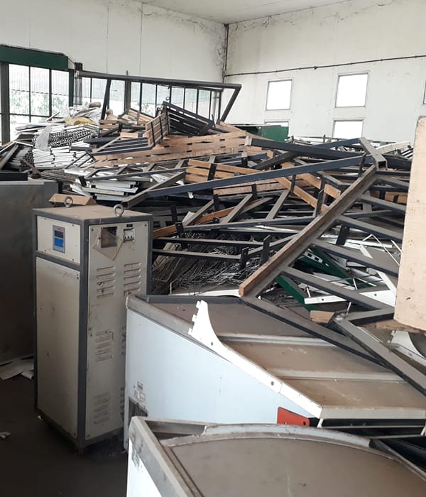 Collected scrap and old fixtures staged at our facility